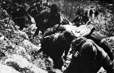 Alpini moving through the Italian mountains.