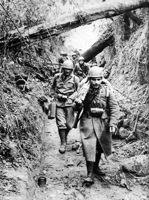 Fucilieri advance through a cutting.