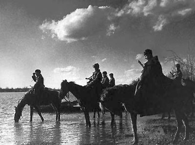 Soviet cavalry stop to water their horses Soviet cavalry stop to water their horses